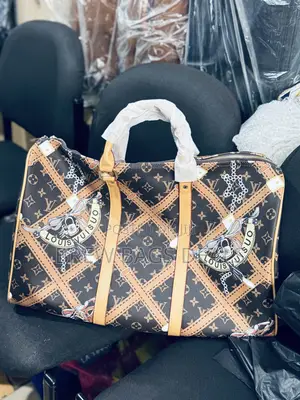 Premium Leather Louis Vuitton Duffle Traveling Bag.