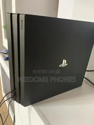 Ps4 Pro Console With Two (2) Controllers (Not Jailbreak)