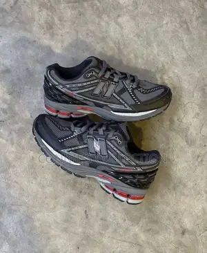 New Balance 1906r Sneakers Feature a Dark Grey and Black Mesh