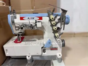 Axis Flatbed Interlock Machine