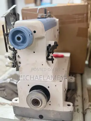 Axis Flatbed Interlock Machine