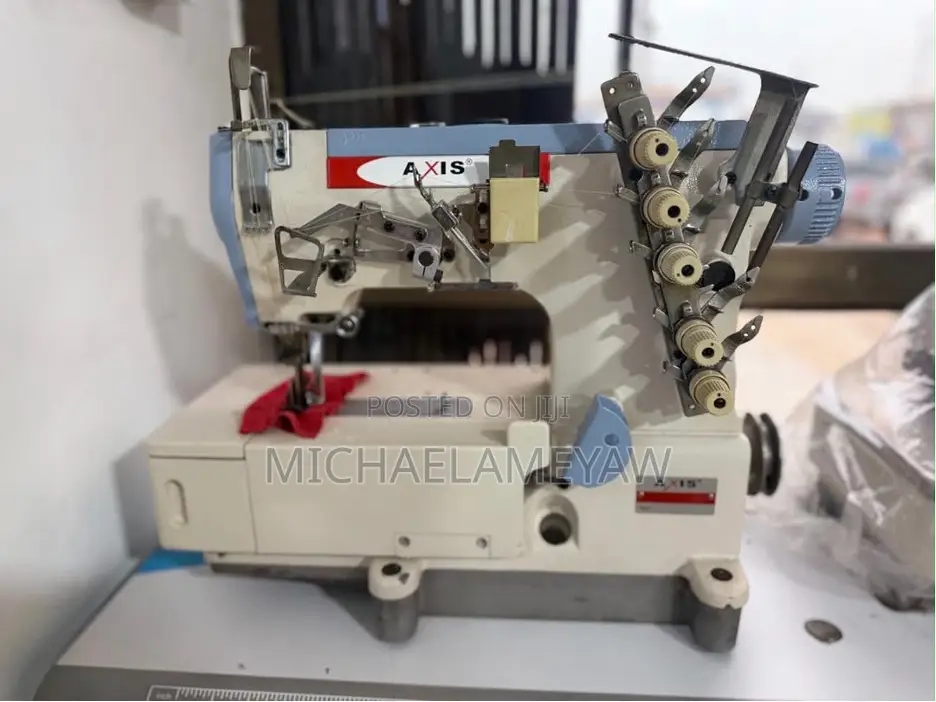 Axis Flatbed Interlock Machine