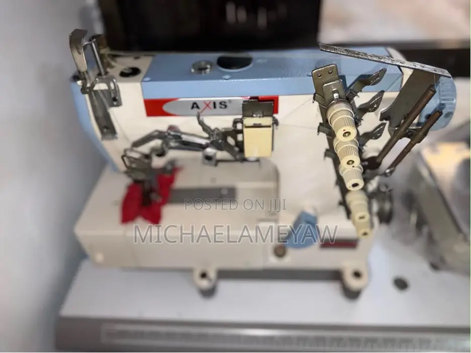 Axis Flatbed Interlock Machine