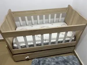 Neat Baby Cot With Mattress for Sale