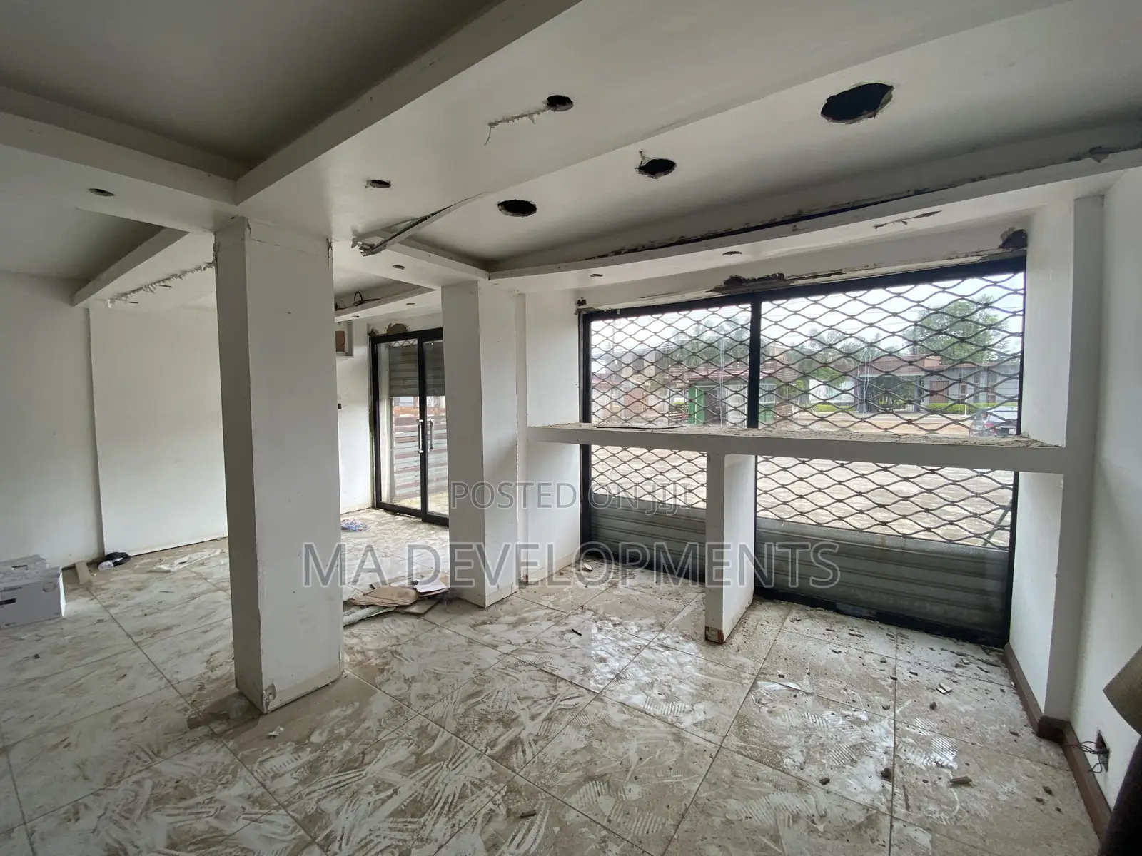 Double Shop With Office for Rent Achimota Neoplan by the Tarred Road.