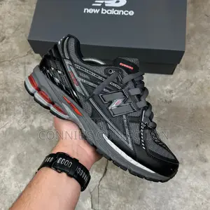 New Balance 1906u Sneakers in a Black and Grey