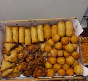 Party Snack Box – Gh₵300 | Spring Rolls, Samosas, Chicken Doughnuts