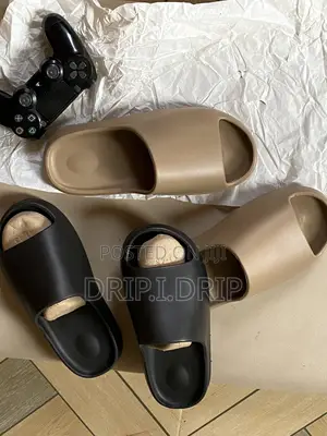 Adidas Yeezy Slides . All Sizes and Colours Available