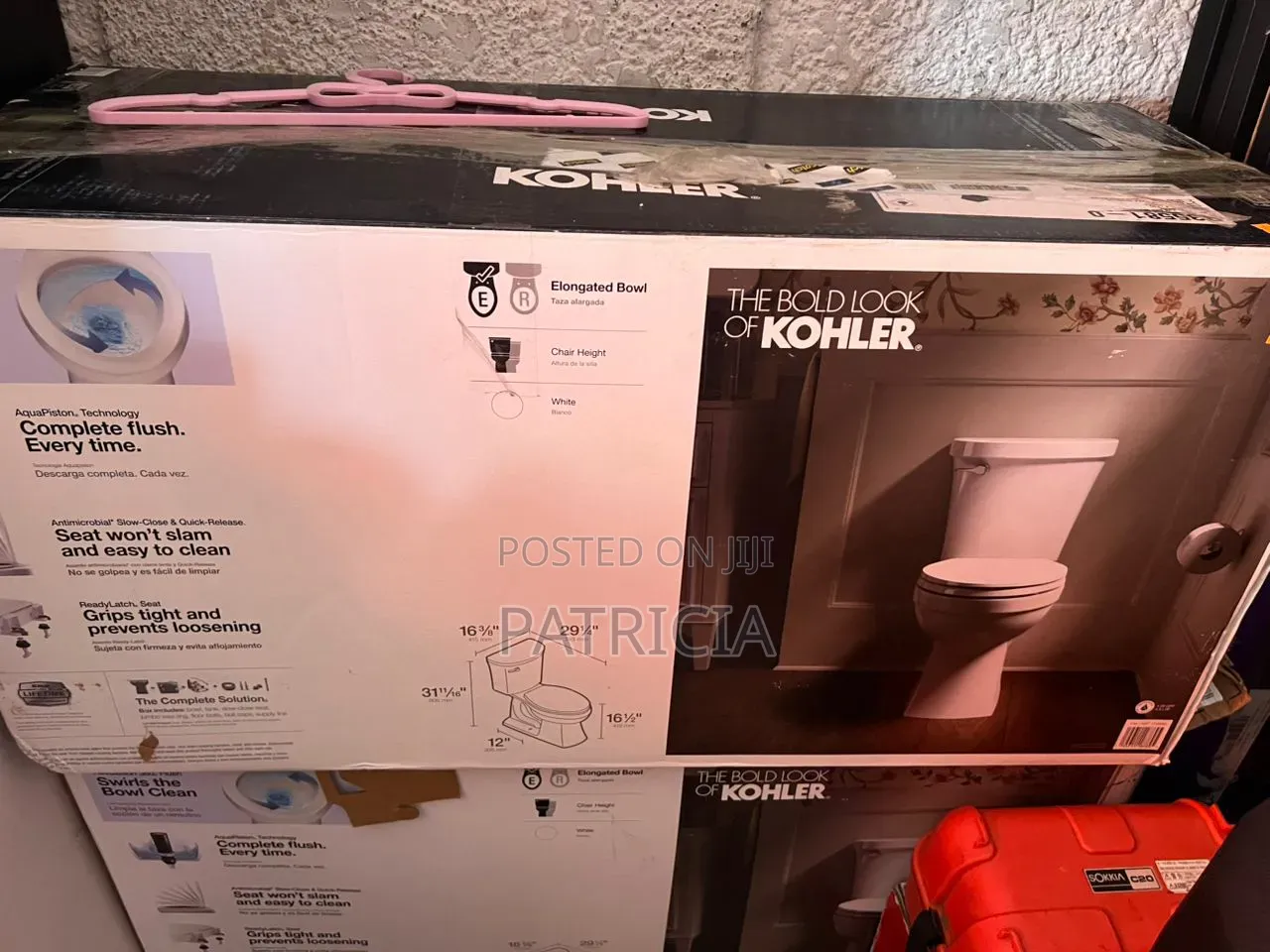 New Kohler Elongated Chair Height Toilet With Soft-Close Seat