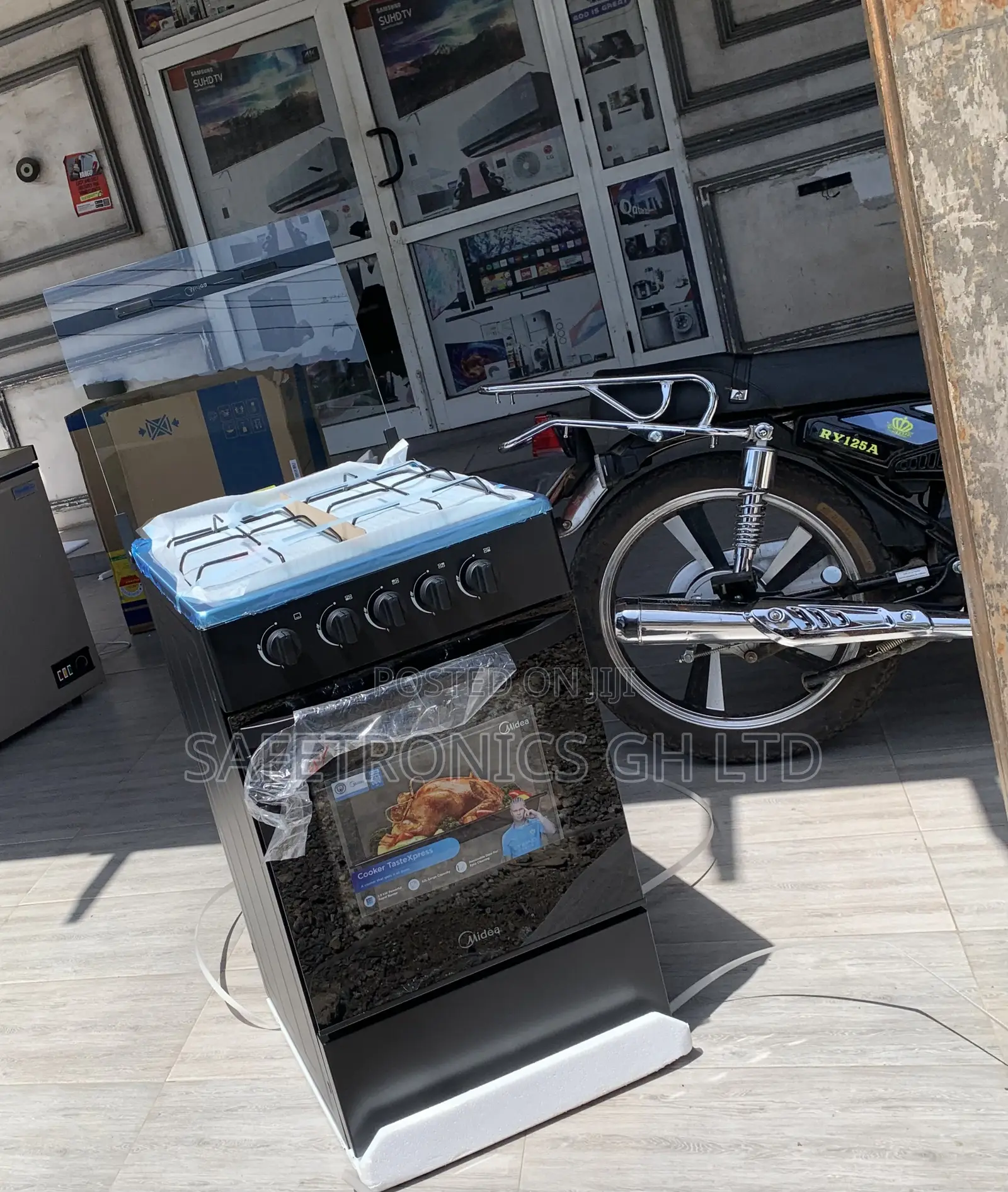 Elegant Black Midea 4 Burner Gas Cooker Lack Mirror