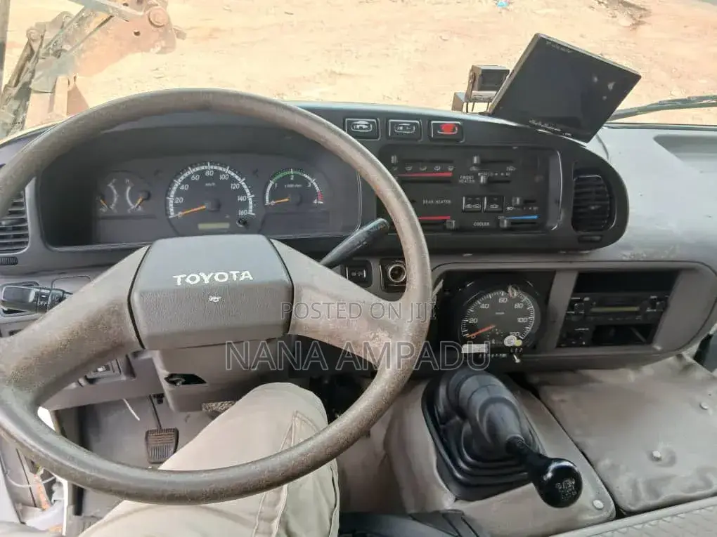 Toyota Coaster 2012 Brown