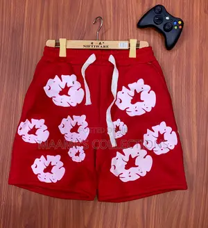 Denim Tears the Cotton Wreath Shorts.
