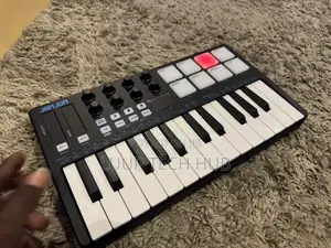 Professional Midi Keyboard 25 Keys With Drum Pad and Play/Pause/Record