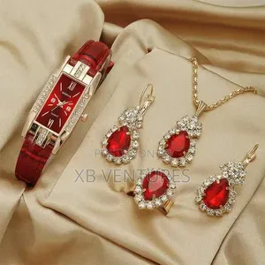 A Set of Accessories Includinga a Pair of Earrings, Necklace, Ring