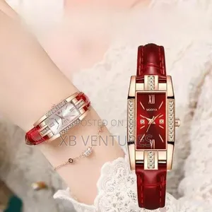 A Set of Accessories Includinga a Pair of Earrings, Necklace, Ring