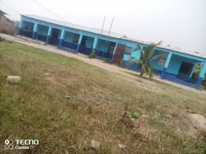 Two Plots Of Land With 6 Classroom Blocks, An Office