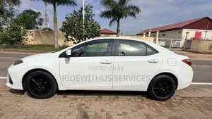 Toyota Corolla L (1.8L 4cyl 2A) 2018 White