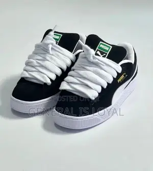 Puma Black and White Sneakers