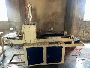 Automatic Plastic Bag Handle-Punching Stacking Machine — Tamale
