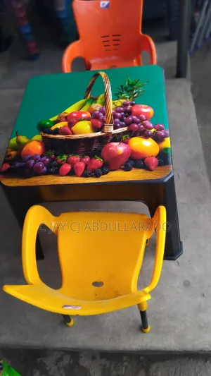 Kiddies Table and Design With Chairs