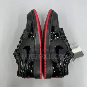 Original Jordan 1 Low Dunk. In Black With Red Sole All Black.