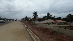 Busy Main Road Side 2 and Half Plots for Sale at Adenta