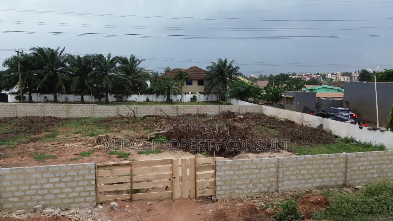 Busy Main Road Side 2 and Half Plots for Sale at Adenta
