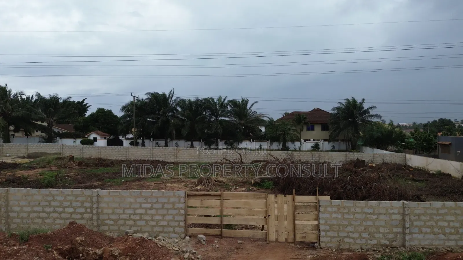 Busy Main Road Side 2 and Half Plots for Sale at Adenta