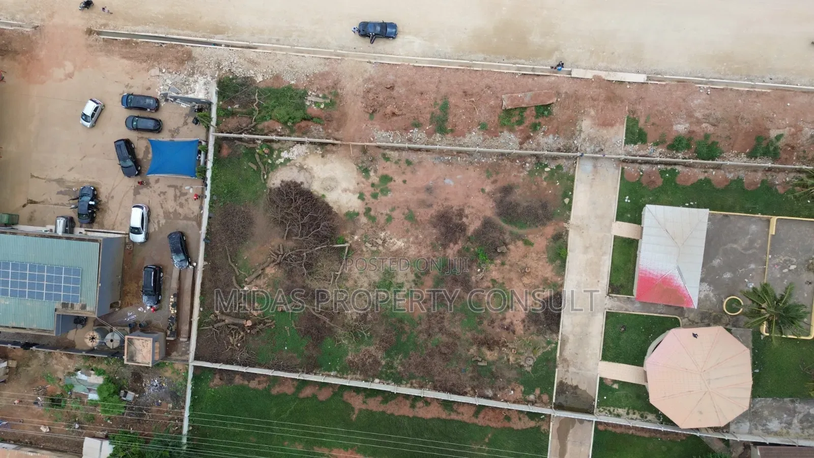 Busy Main Road Side 2 and Half Plots for Sale at Adenta