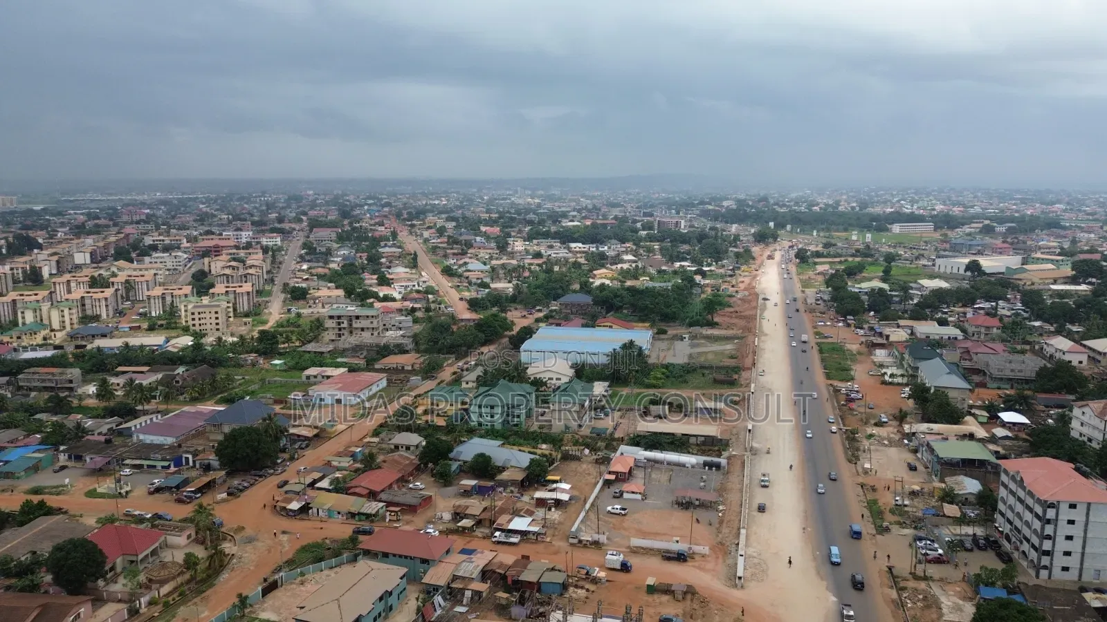 Busy Main Road Side 2 and Half Plots for Sale at Adenta