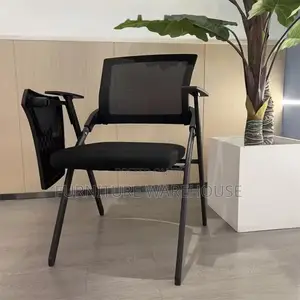 Ergonomic Mesh Training Chair With Foldable Writing Tablet Arm.