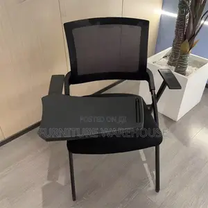 Ergonomic Mesh Training Chair With Foldable Writing Tablet Arm.