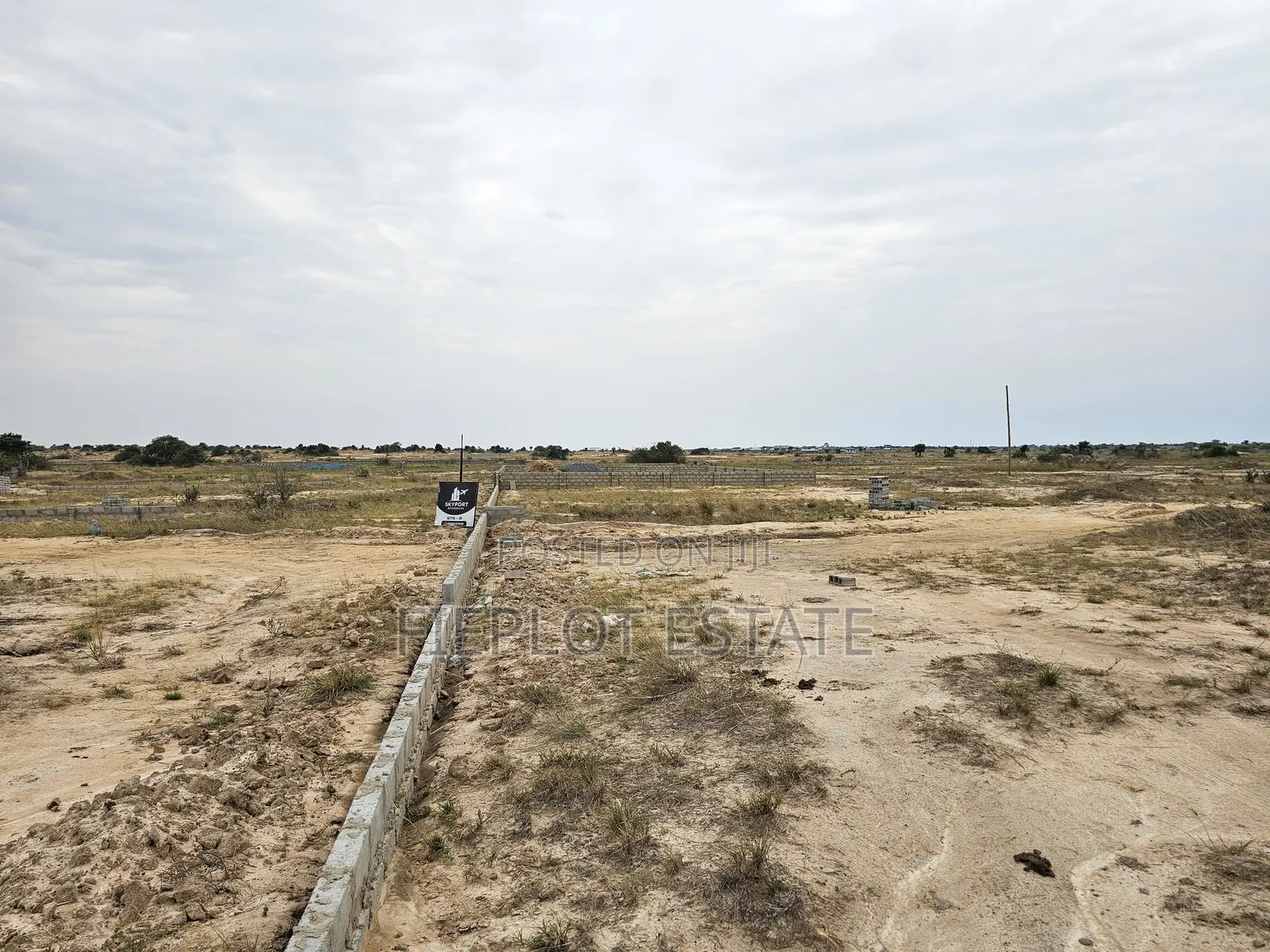 Build With Confidence — Half Plot Land at Tsopoli Skyport City