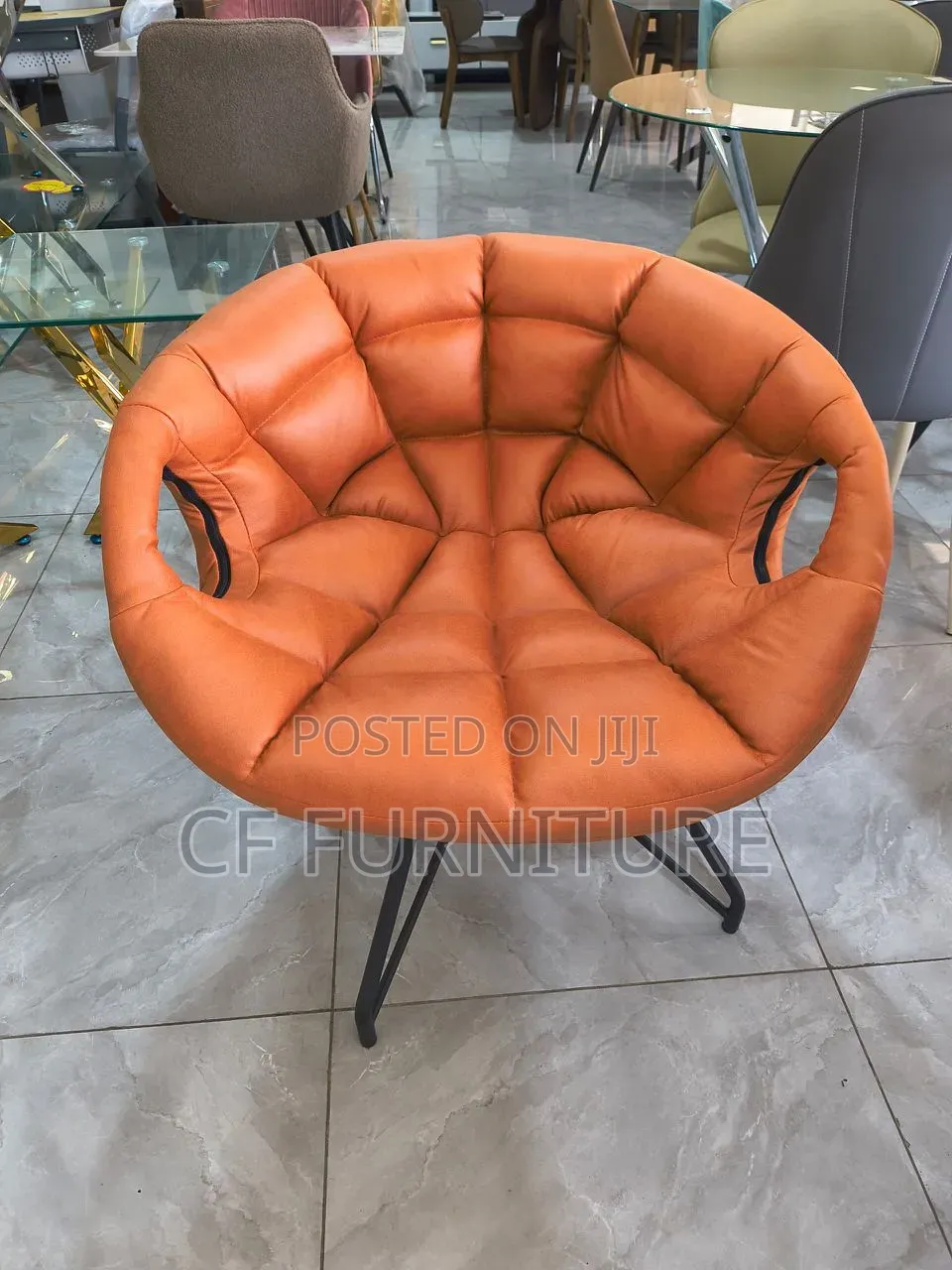 The Orbit Tufted Accent Chair