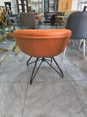 The Orbit Tufted Accent Chair