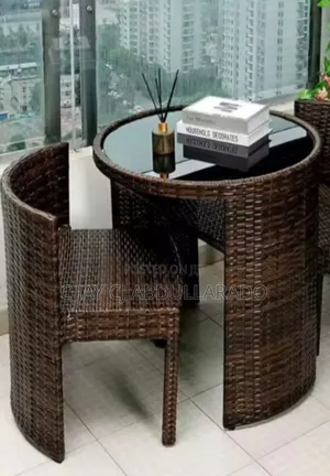 Two Chairs With Table and Glass
