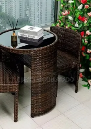 Two Chairs With Table and Glass