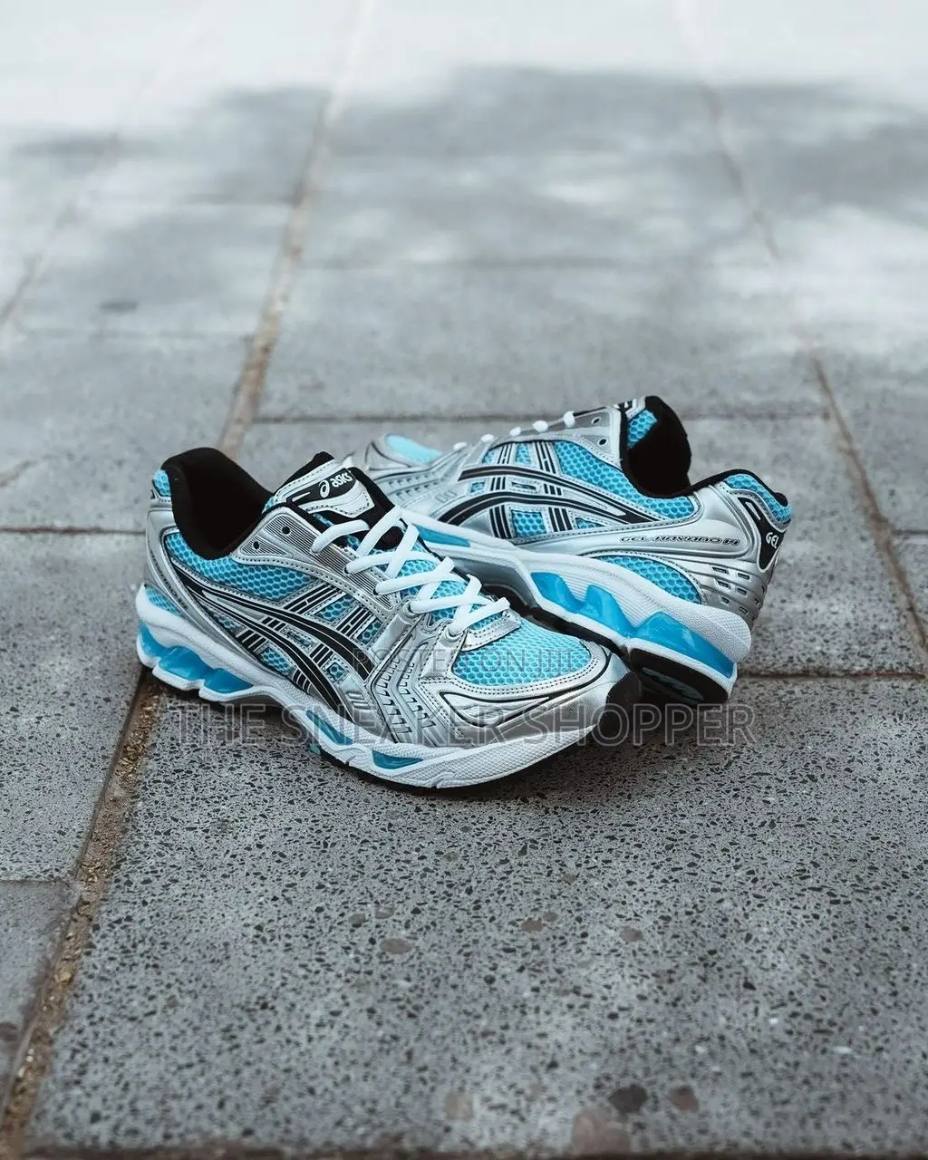 Asics Sea Blue and White Color