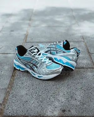 Asics Sea Blue and White Color