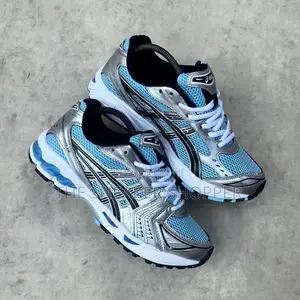 Asics Sea Blue and White Color
