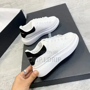 Alexander McQueen ( White ) . Comes in Box .Highly Authentic and Tough