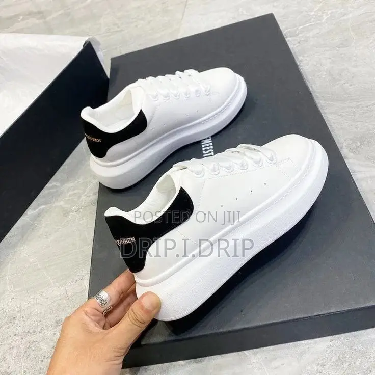 Alexander McQueen ( White ) . Comes in Box .Highly Authentic and Tough