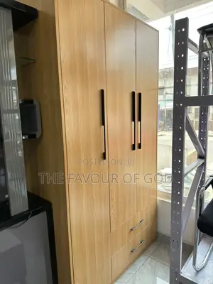 A Weighty 3 Door Mirrorless Wardrobe