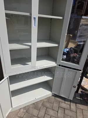 Metal Filing Cabinet, Top Glass Doors and Lock Bottom Compartment.