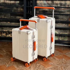 Hard-Shell Suitcases Feature a Wide-Handle Design