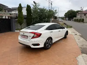 Honda Civic Touring 2dr Coupe (1.5L 4cyl) 2017 White