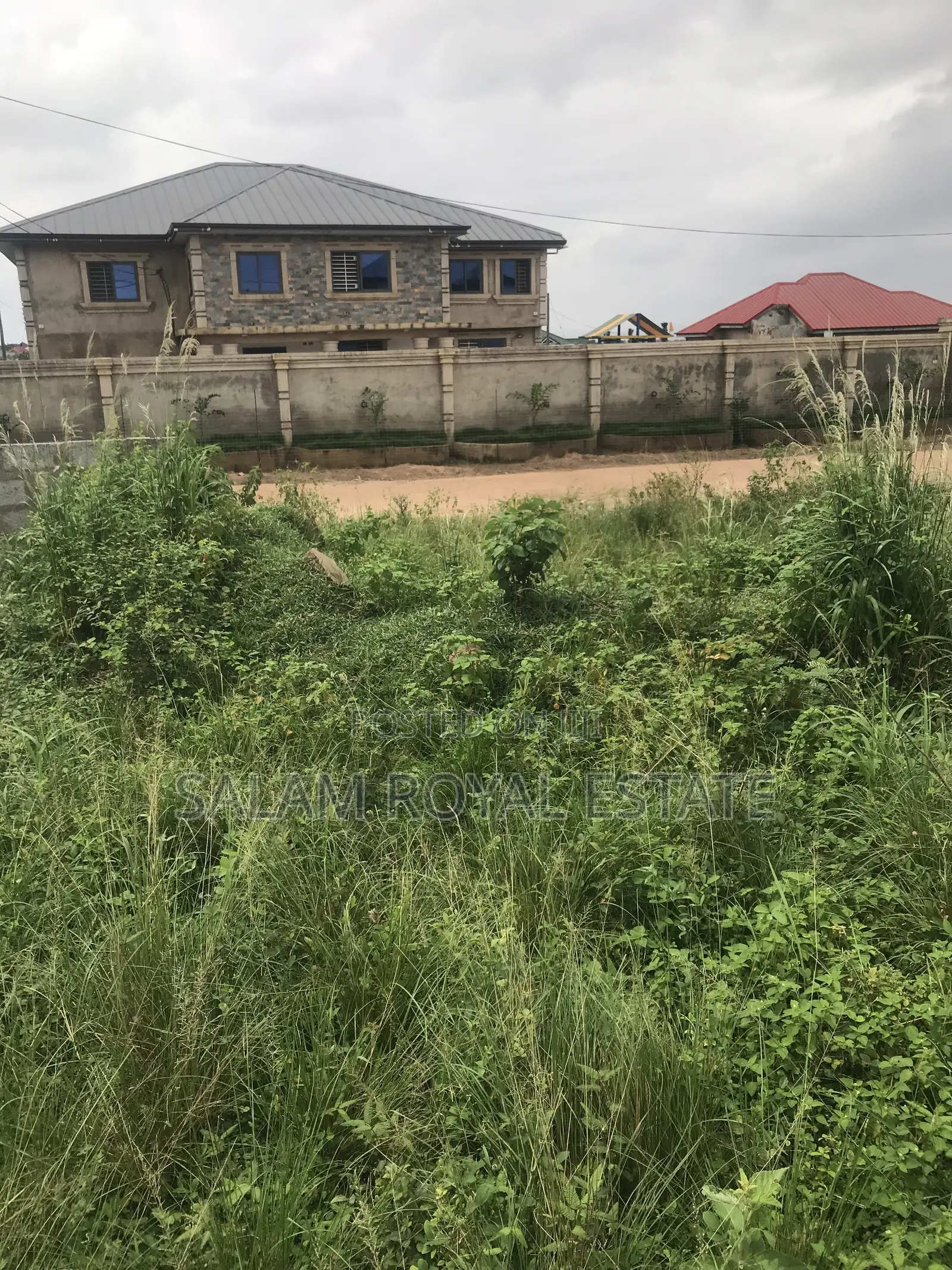 Half Plot With Wall at Amasaman Kasoa Road