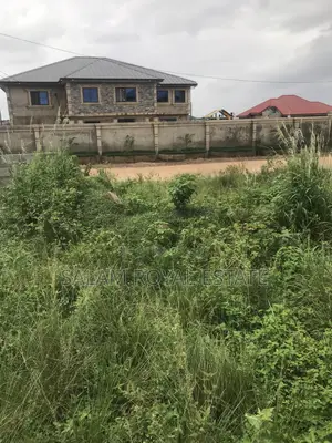 Half Plot With Wall at Amasaman Kasoa Road