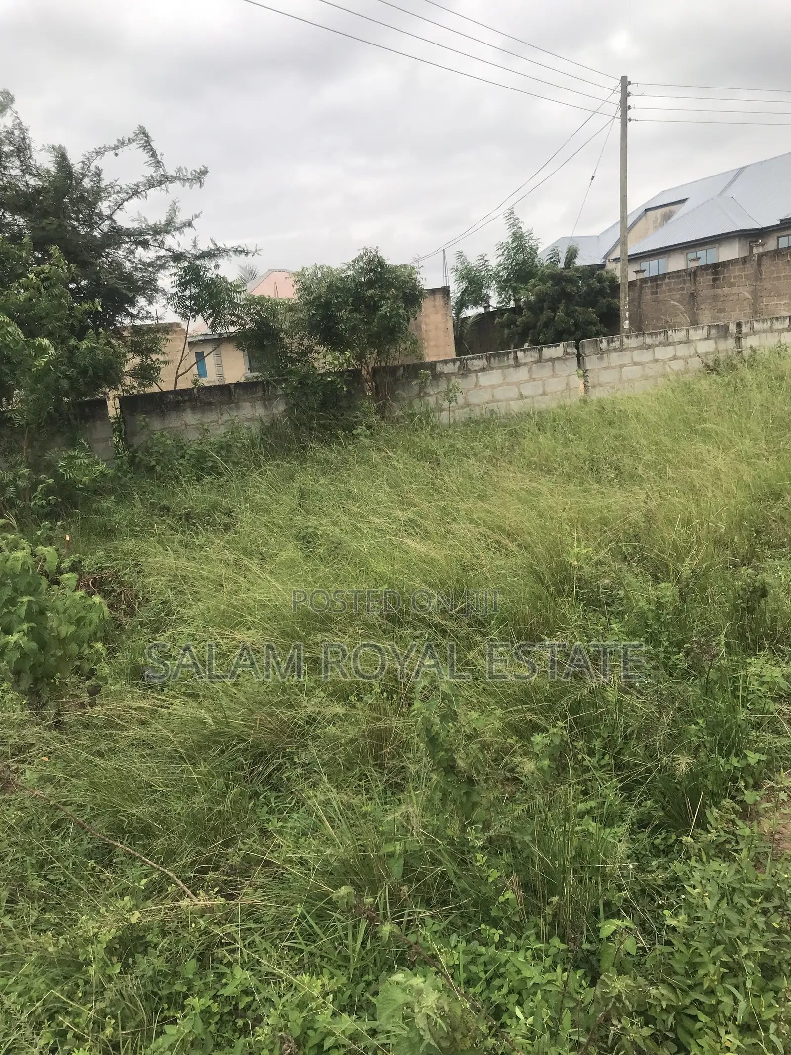 Half Plot With Wall at Amasaman Kasoa Road