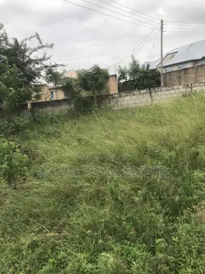 Half Plot With Wall at Amasaman Kasoa Road